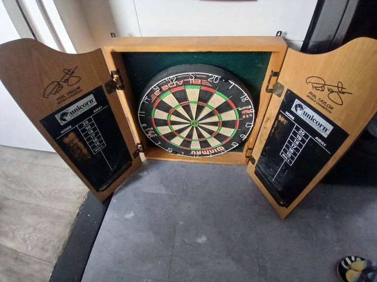 image for Dartboard in Cabinet with loads of darts, flights, stems etc