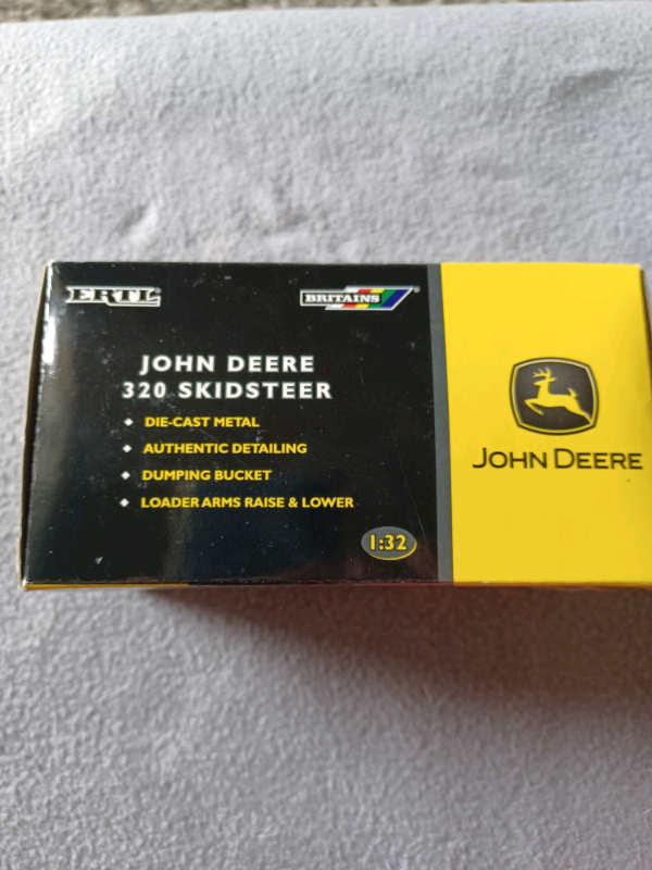 John deere Britains /Ertl 320 skid steere