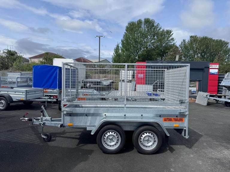 NEW 8,2ft X 4,3ft (BC752) TWIN AXLE TRAILER WITH 80CM MESH & RAMP 1300KG