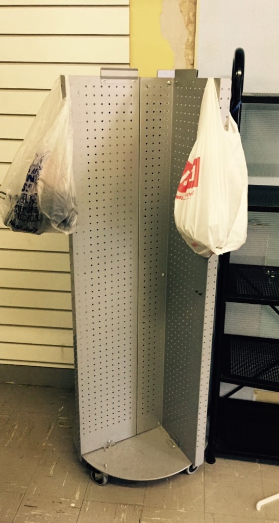 large metal retail stand shelves on wheels prop shop