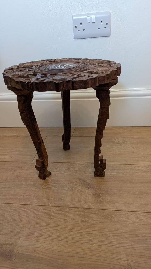 Carved wooden table