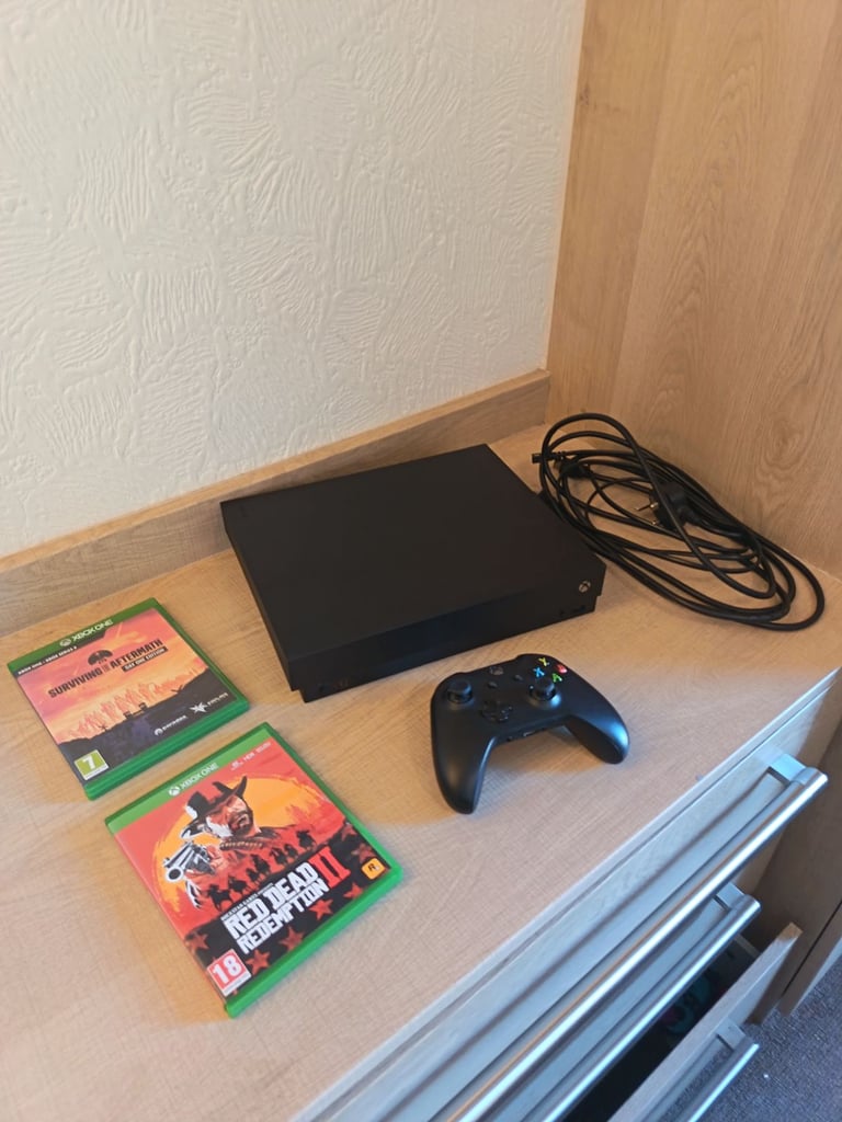 image for Xbox One X 1TB Console with Controller and games