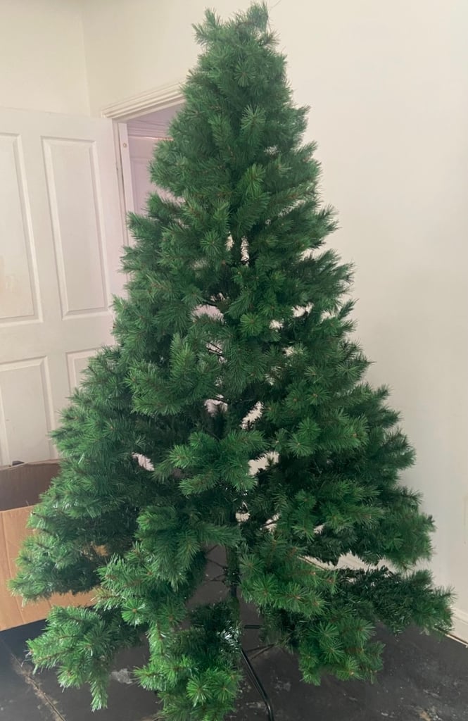 image for Everlands 7ft Christmas tree with stand £60 ono