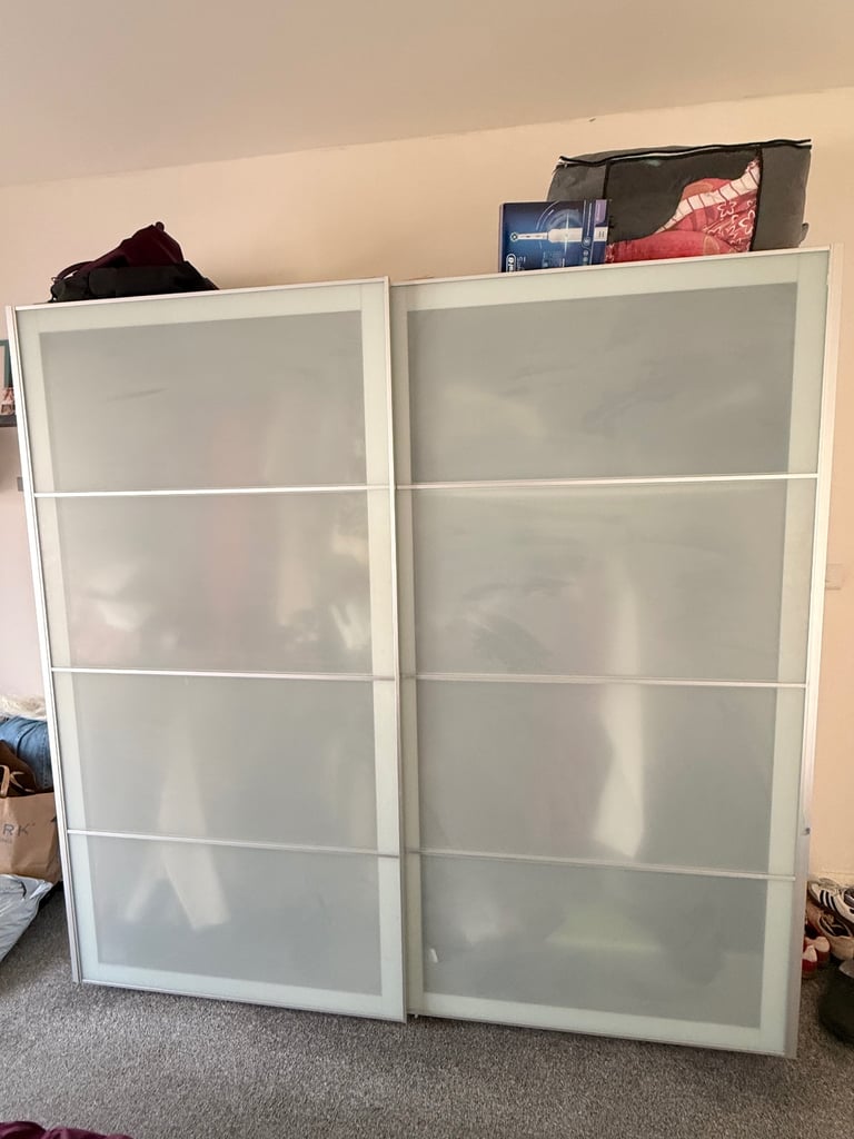 Pax wardrobe with sliding doors and LED lights 