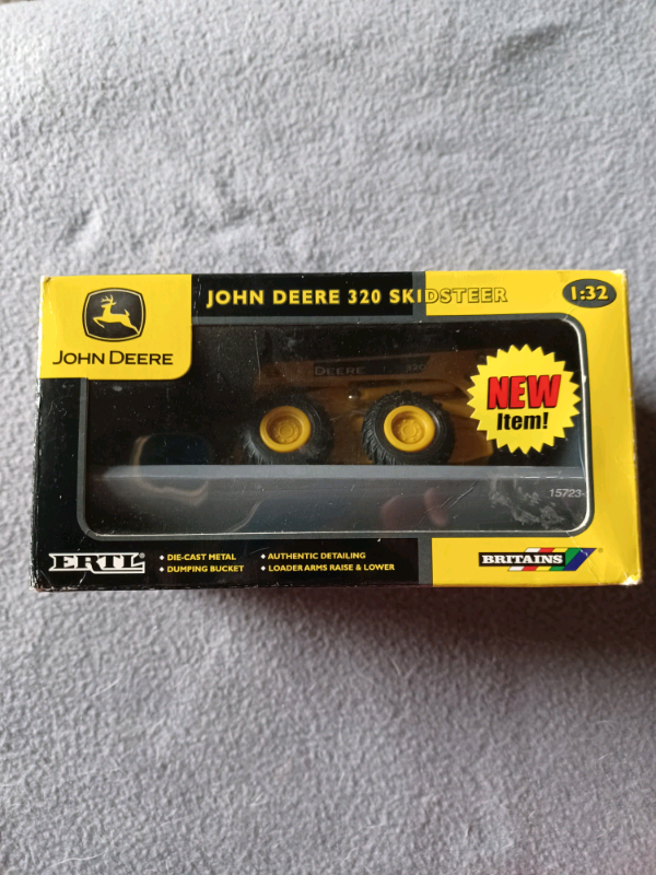 John deere Britains /Ertl 320 skid steere