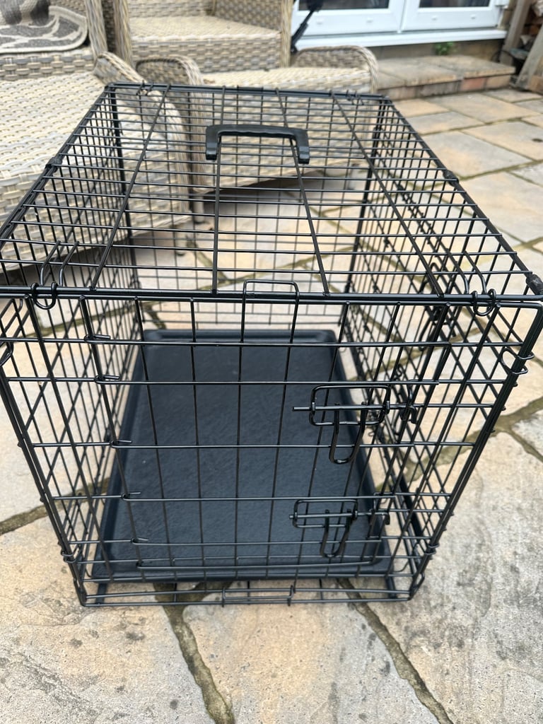 Lovely black dog crate for small/toy dog.