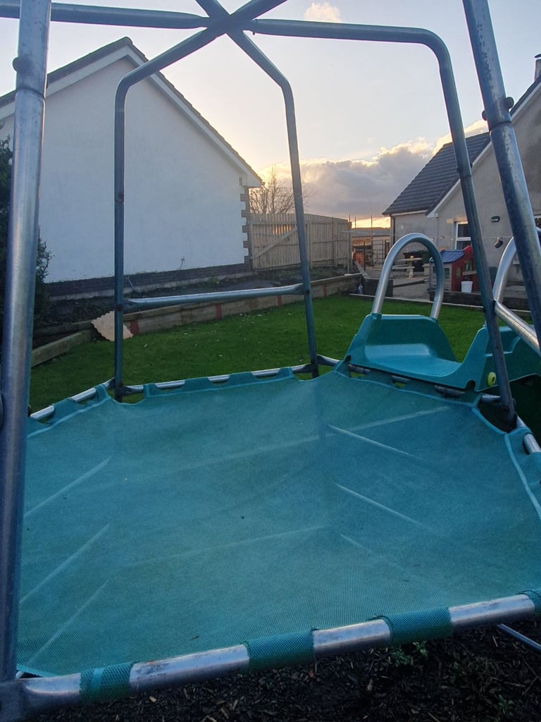 Climbing frame with slide