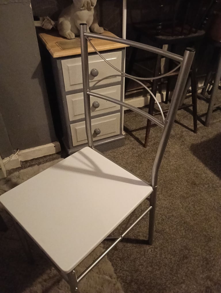 White dining table and four chairs feel free to contact me 