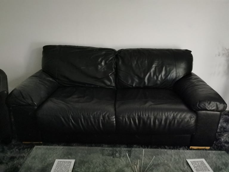 Leather sofa and small chair