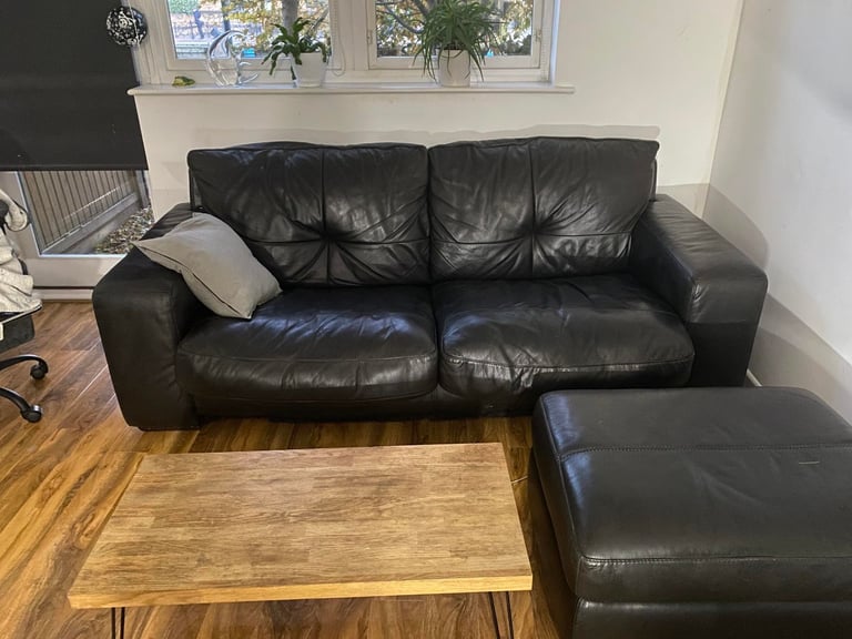 black Leather Sofa with matching pouf