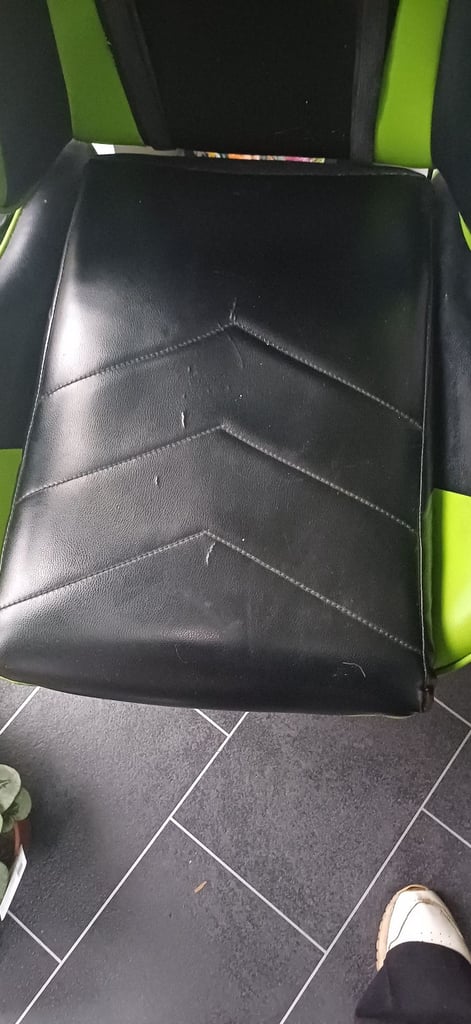 Black and green gaming chair.