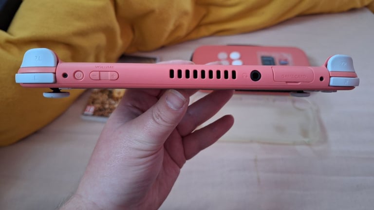 Nintendo switch lite coral pink 