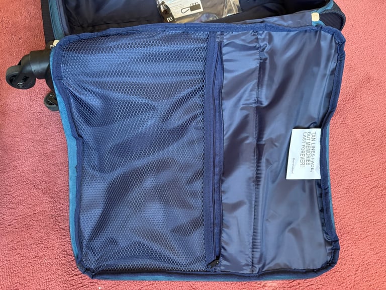 Small suitcase with wheels and extending handle