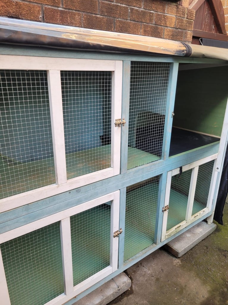 2 storey rabbit hutch with thermal rain cover.