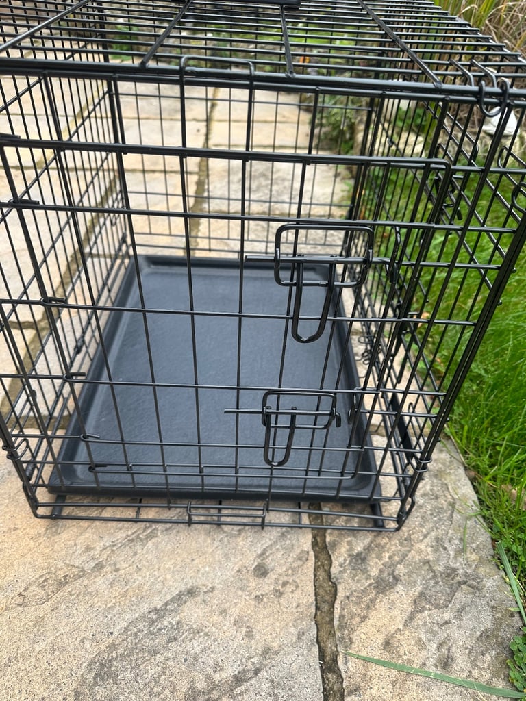 Lovely black dog crate for small/toy dog.