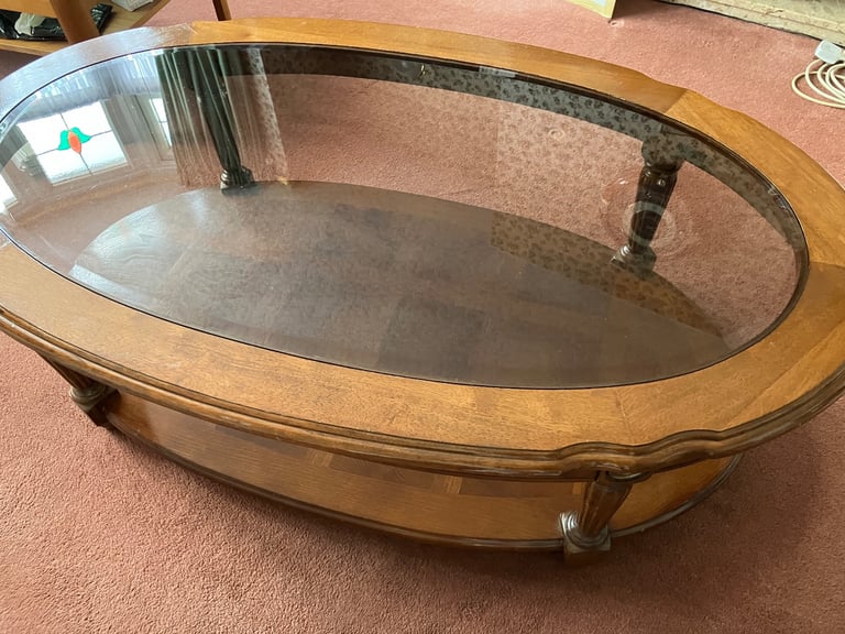 OVAL WALNUT COFFEE TABLE WITH GLASS TOP