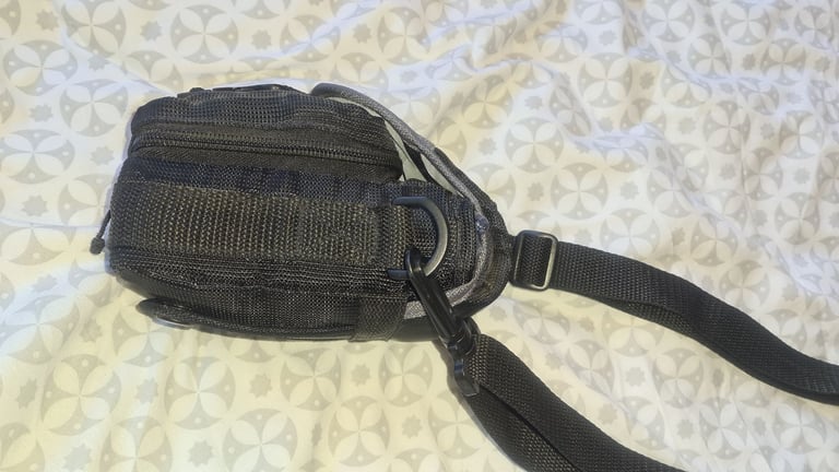 Camera bag/ case with shoulder strap. Multiple compartments. Excellent quality and condition.