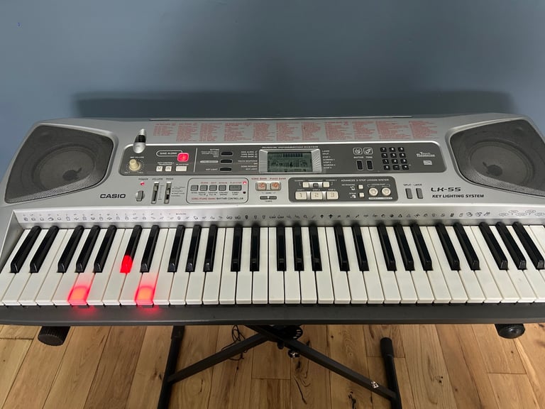 Casio Keyboard and Stand, with Learn to Play Function