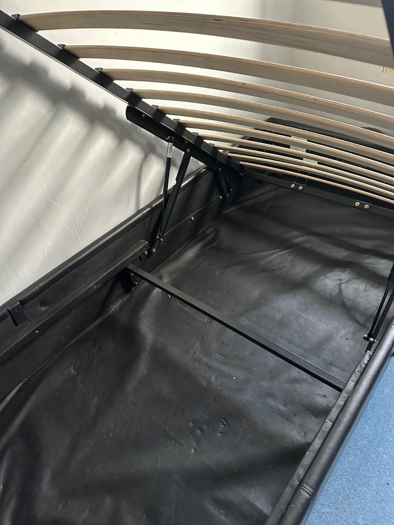 image for Black leather single Ottoman 