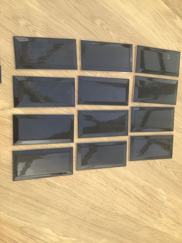 12 Black Wall Tiles  20 x 10 Cm  each tile Plus some cut Pieces  £ 3.00 for all 