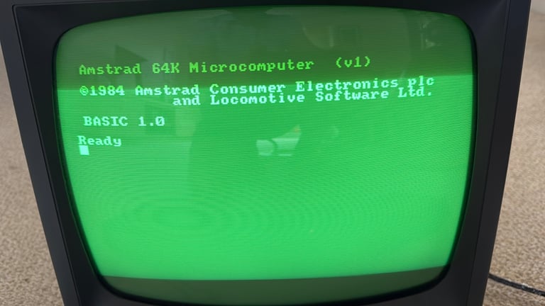 Amstrad CPC464 computer with green screen monitor