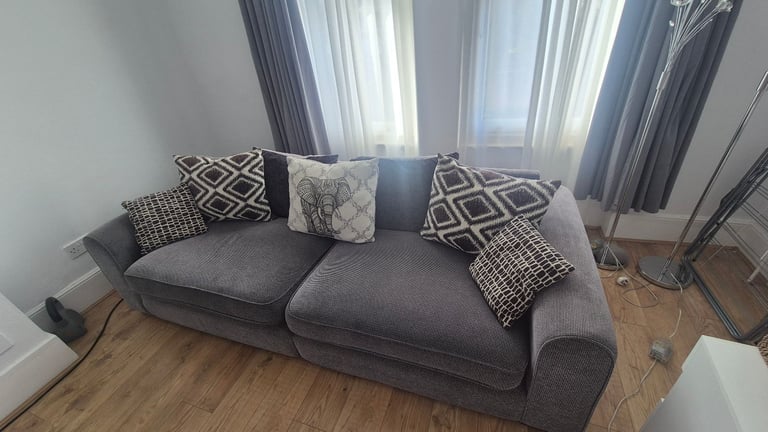 4 seater Sofa with footstall