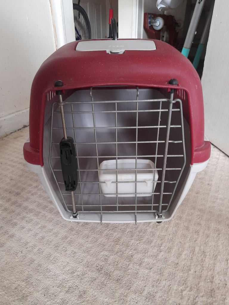 image for Pet carrier with food/water bowl on door for sale 