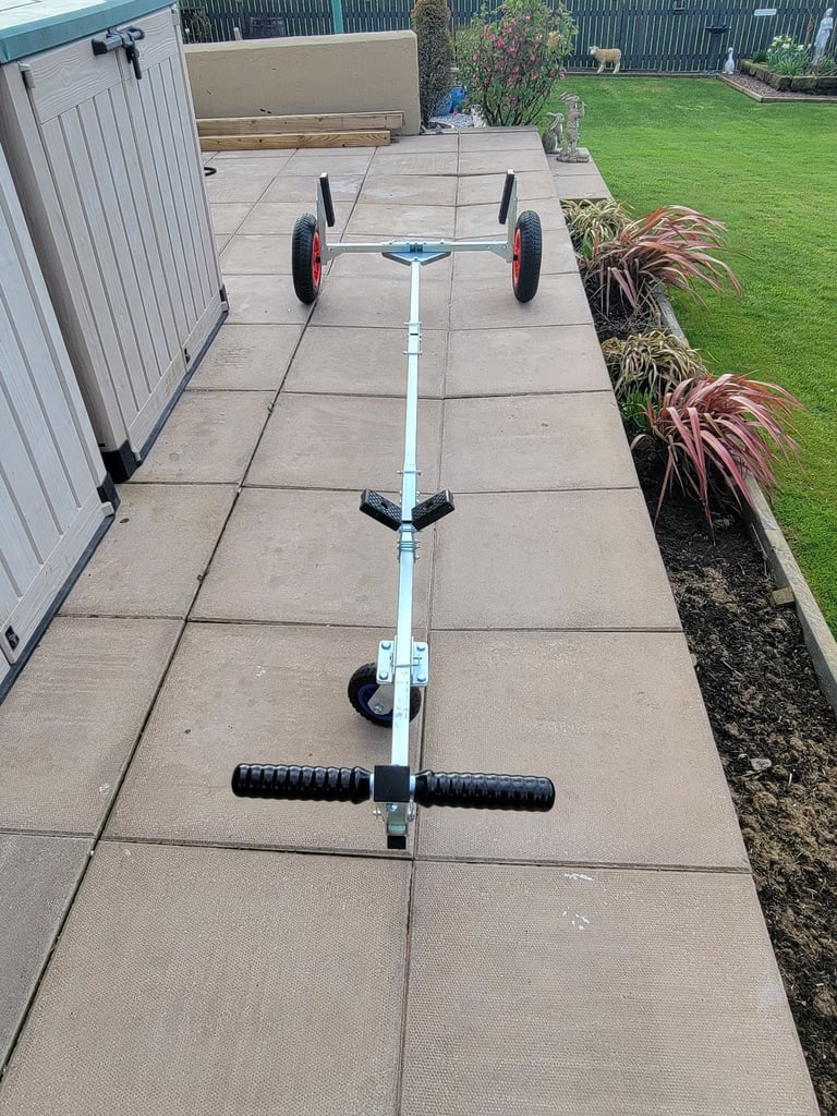 Folding portable kayak or boat trailer.