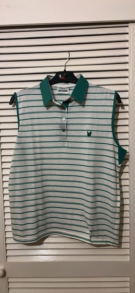 This is a sleeveless polo shirt by the Scottish brand Lyle & Scott