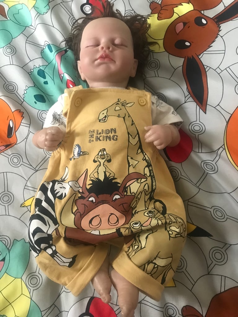real life looking boy doll 