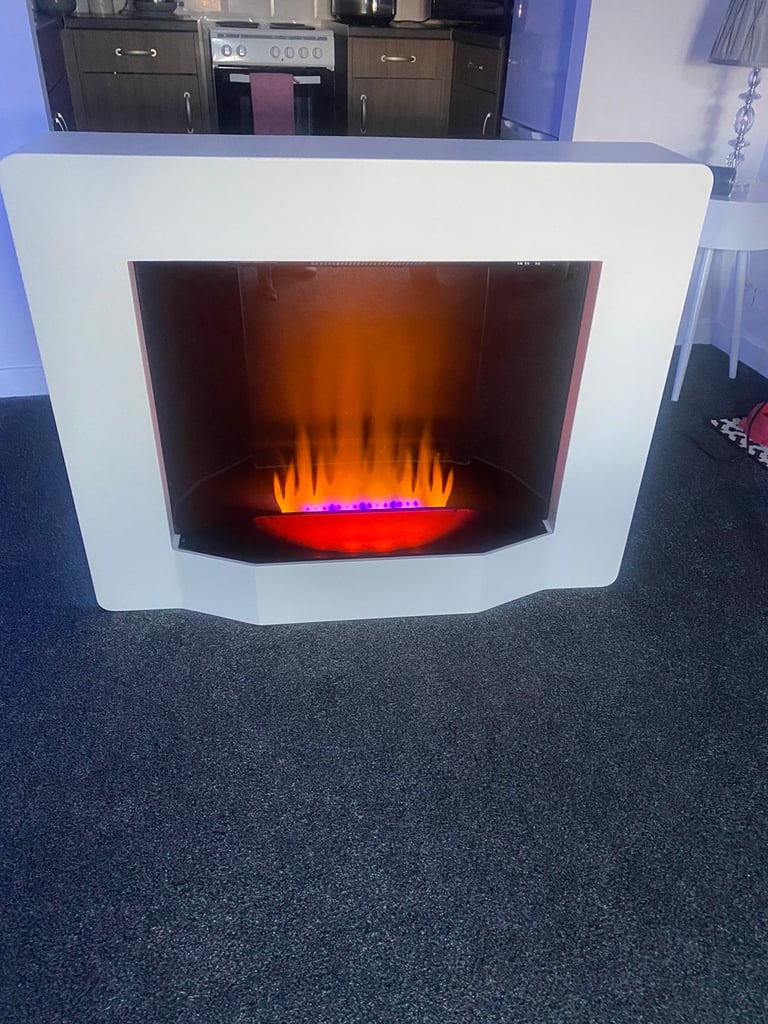 White fireplace with fan heater built in & remote control 