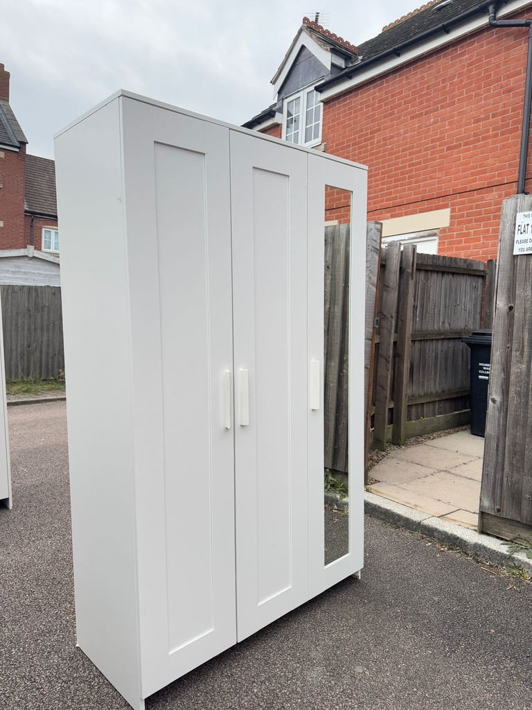 IKEA BRIMNES 3-Door Wardrobe with Hanging Rail and Shelves.