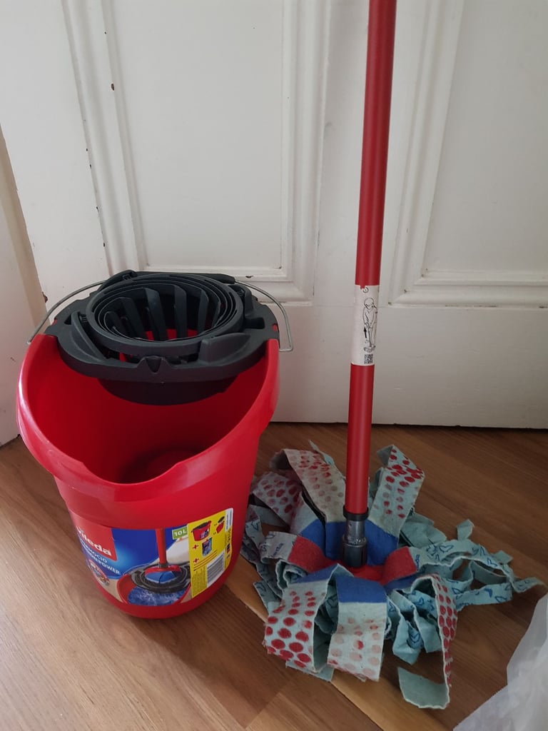 Vileda Supermocio 3action Mop and Bucket on a Wood Effect Vinyl Floor