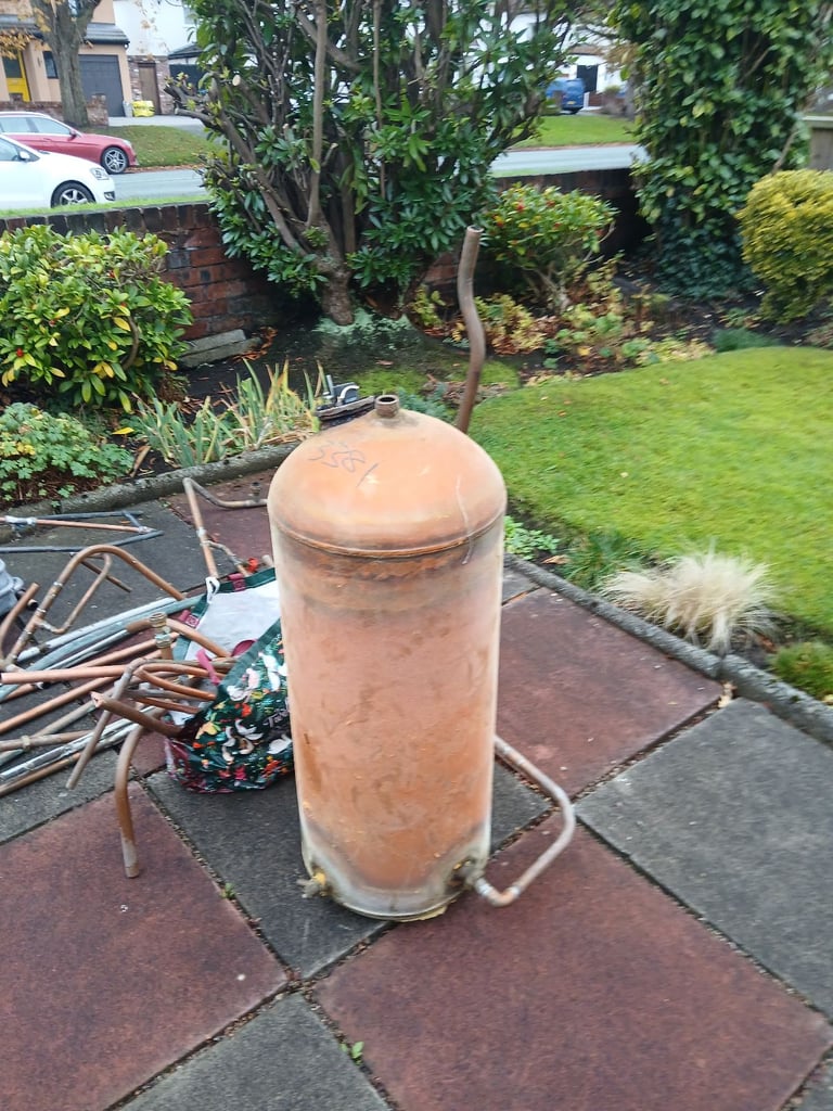 Old copper boiler and others copper pipes and metals