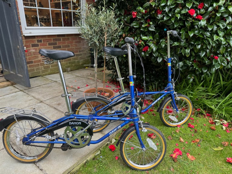Two light weight DAHON blue folding bikes