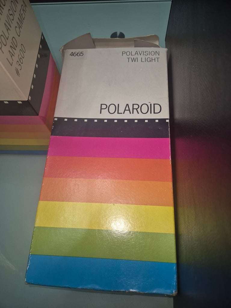 Polaroid land cameras and player screen