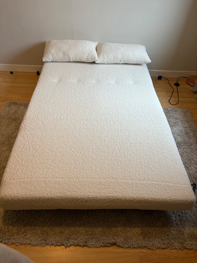 Double white boucle sofa bed