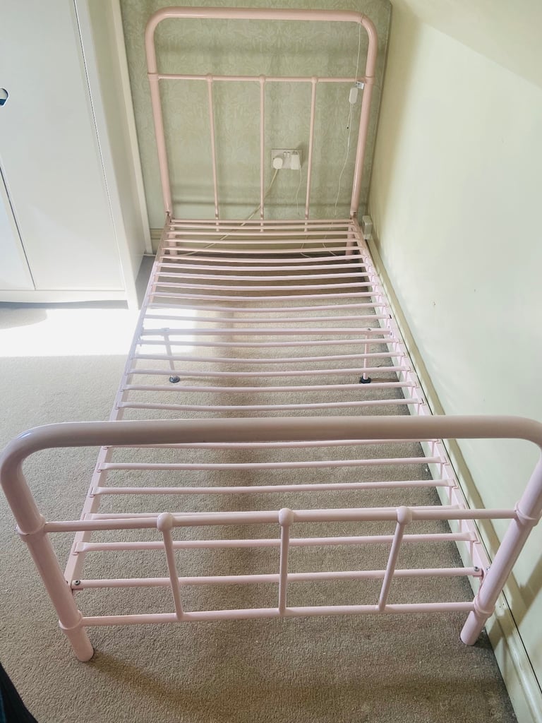 Single metal bed frame with mattress
