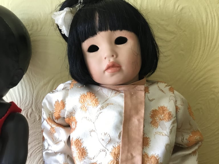 TWO VINTAGE DOLLS.  1950s BLACK RODDY DOLL + COLLECTOR’S CHINESE GIRL.