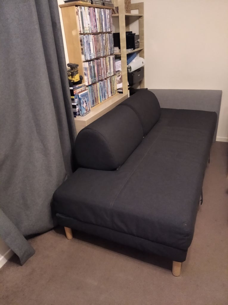 Ikea FLOTTEBO single sofa bed with storage and two pillows