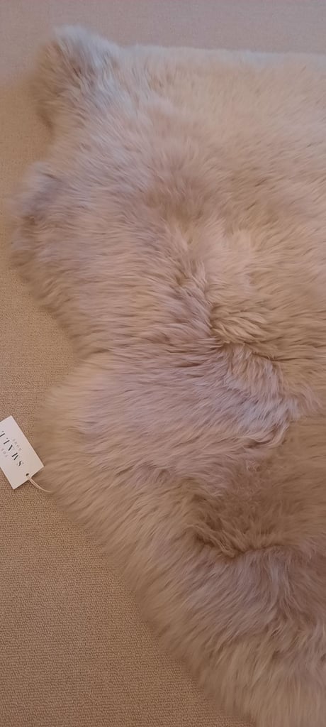 Brand new John Lewis sheepskin rug 