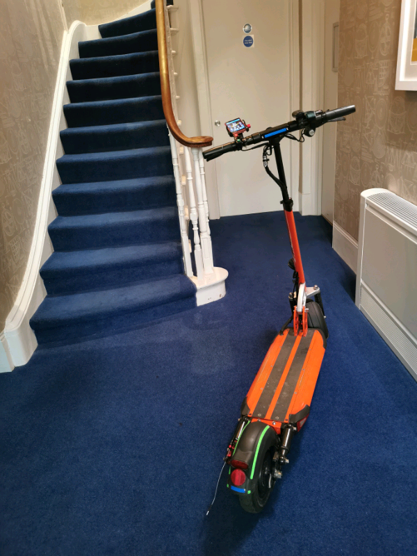 From USA an Orange electric scooter EMOVE Cruiser 'S' 52V 1600W Dual