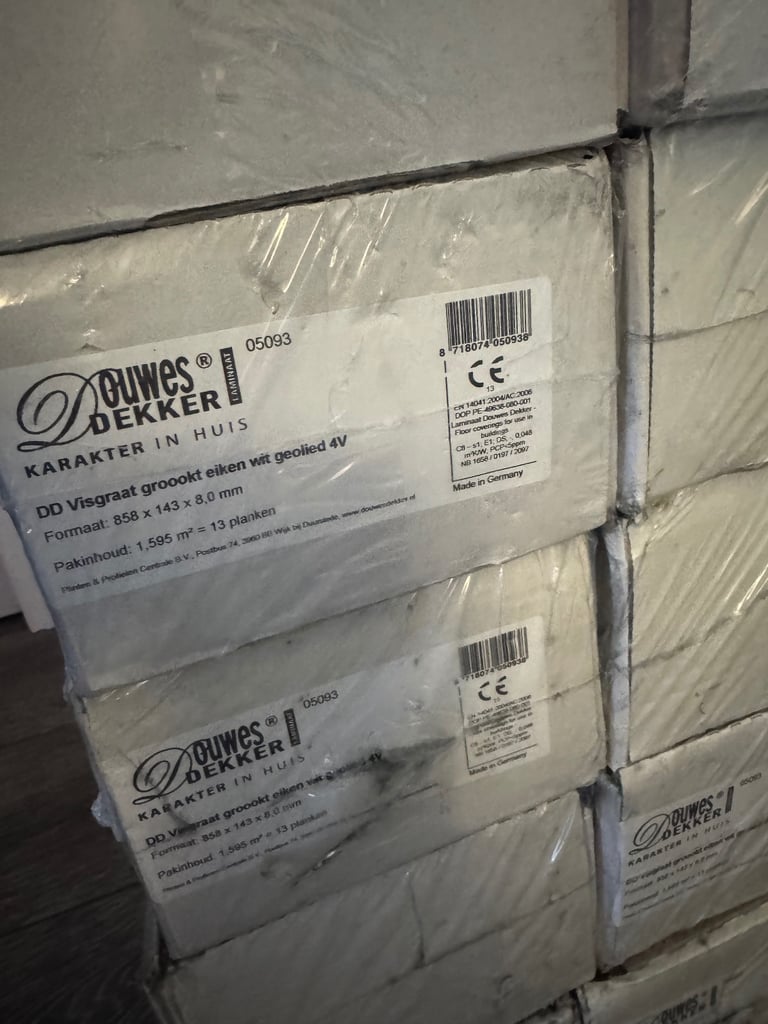 Light oak herringbone laminate flooring 8mm boards