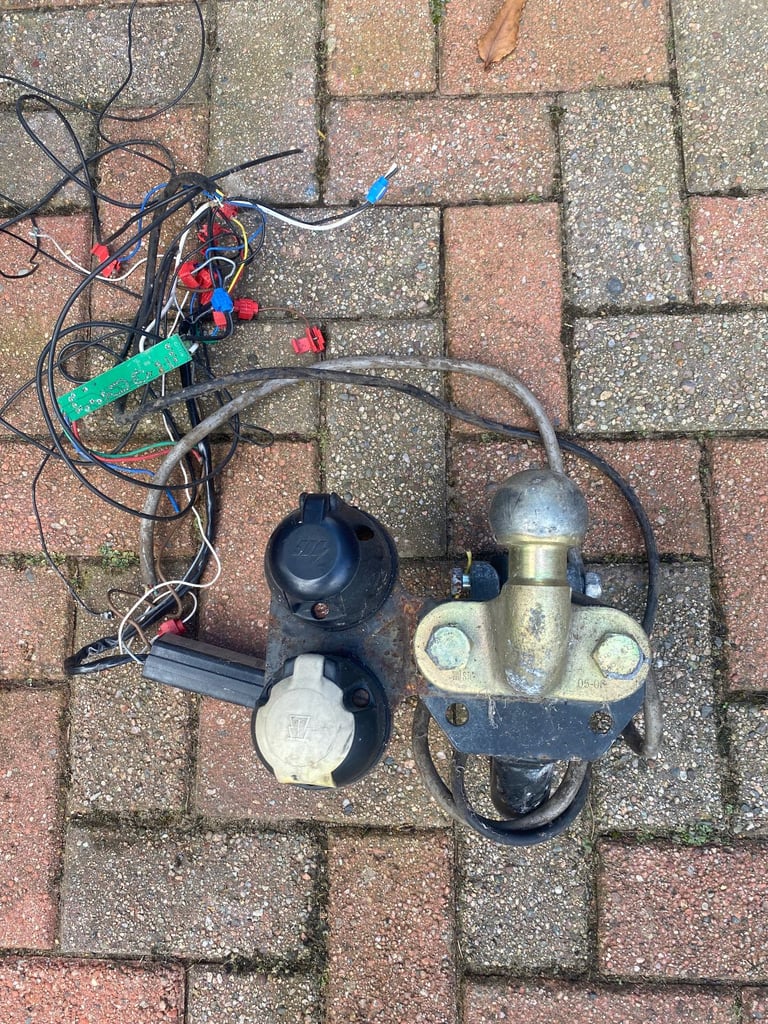 Tow bar with electric fittings