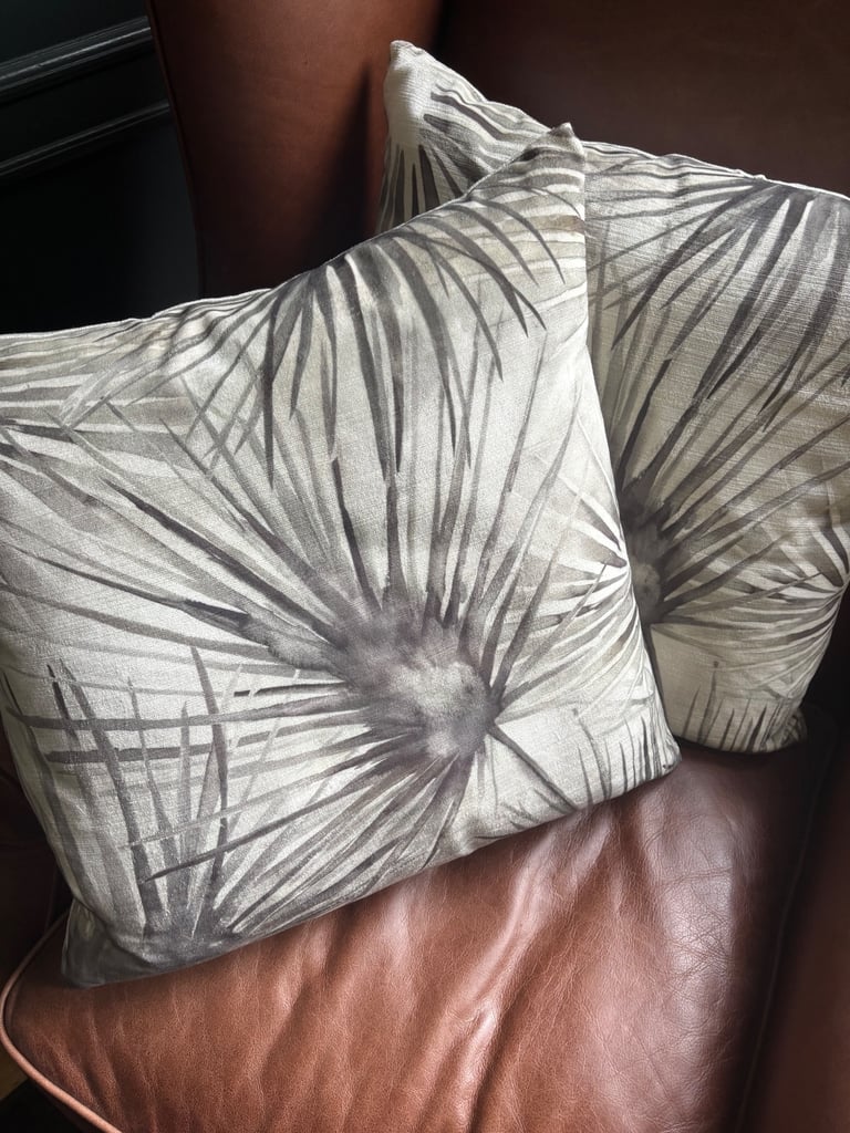 2 grey cushions