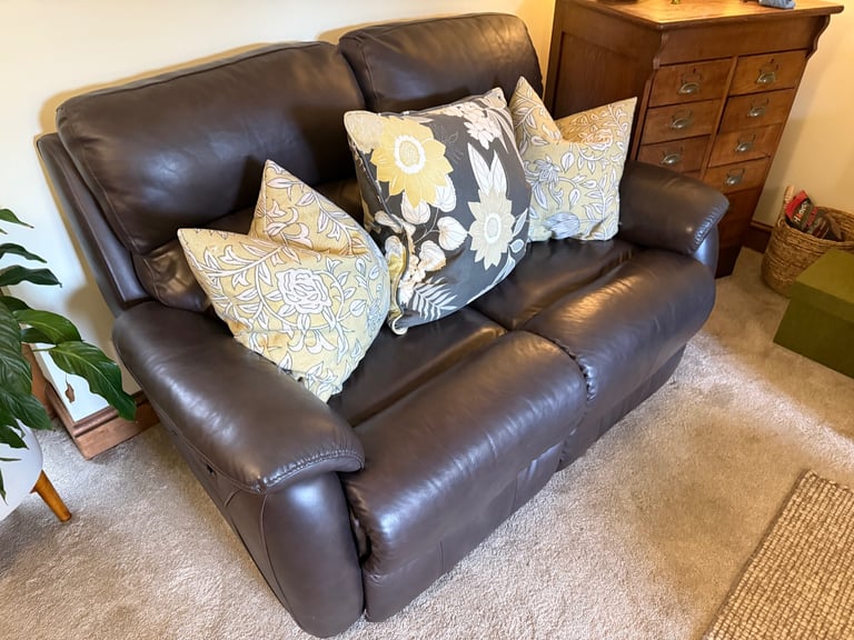 Leather two seater reclining sofa