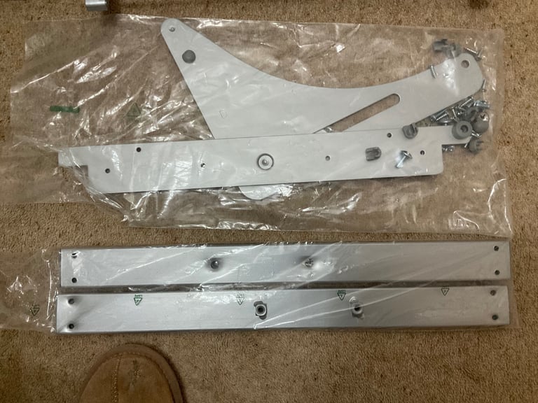 Brand new .Magic corner pull out basket system for Left Hand opening on corner unit.