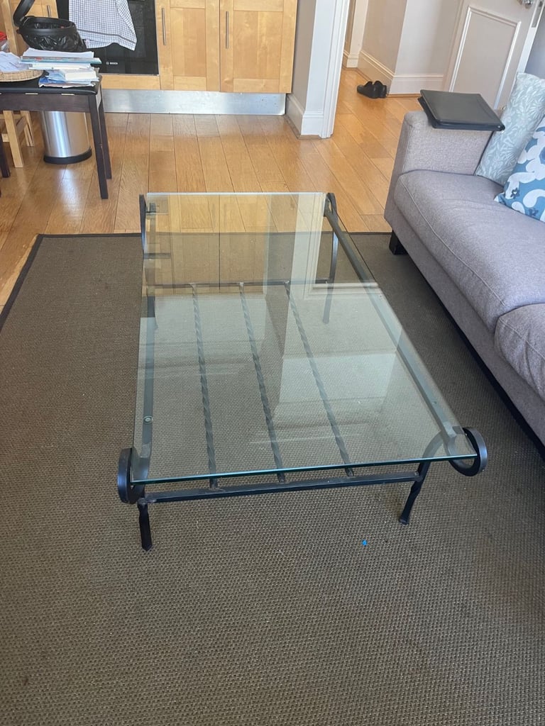 Wrought iron and glass coffee table