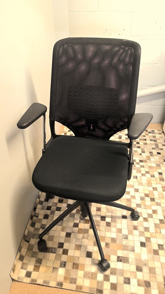 image for used swivel office chair with adjustable backrest and adjustable arms 