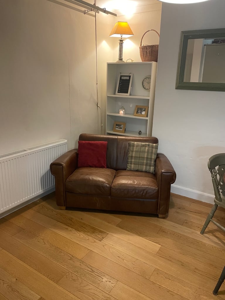 Tan/Brown Leather compact couch